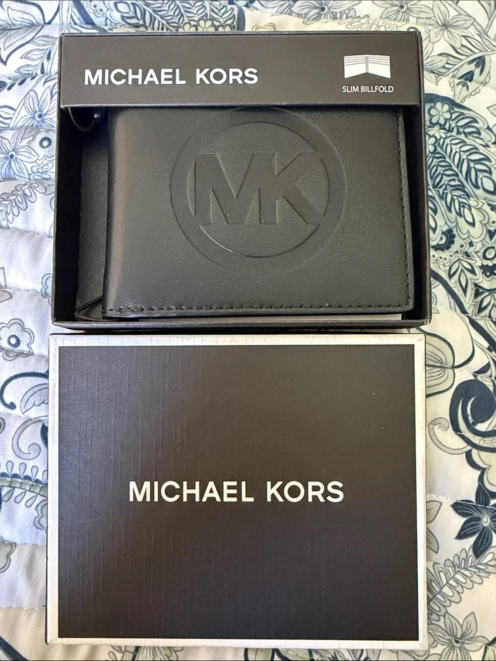 Michael Kors Black Slim Leather Billfold Wallet with Embossed MK